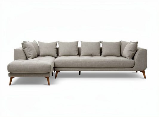 Sofa narożna z jasnoszarym materiałem i wymiarami 250 x 90 x 70cm